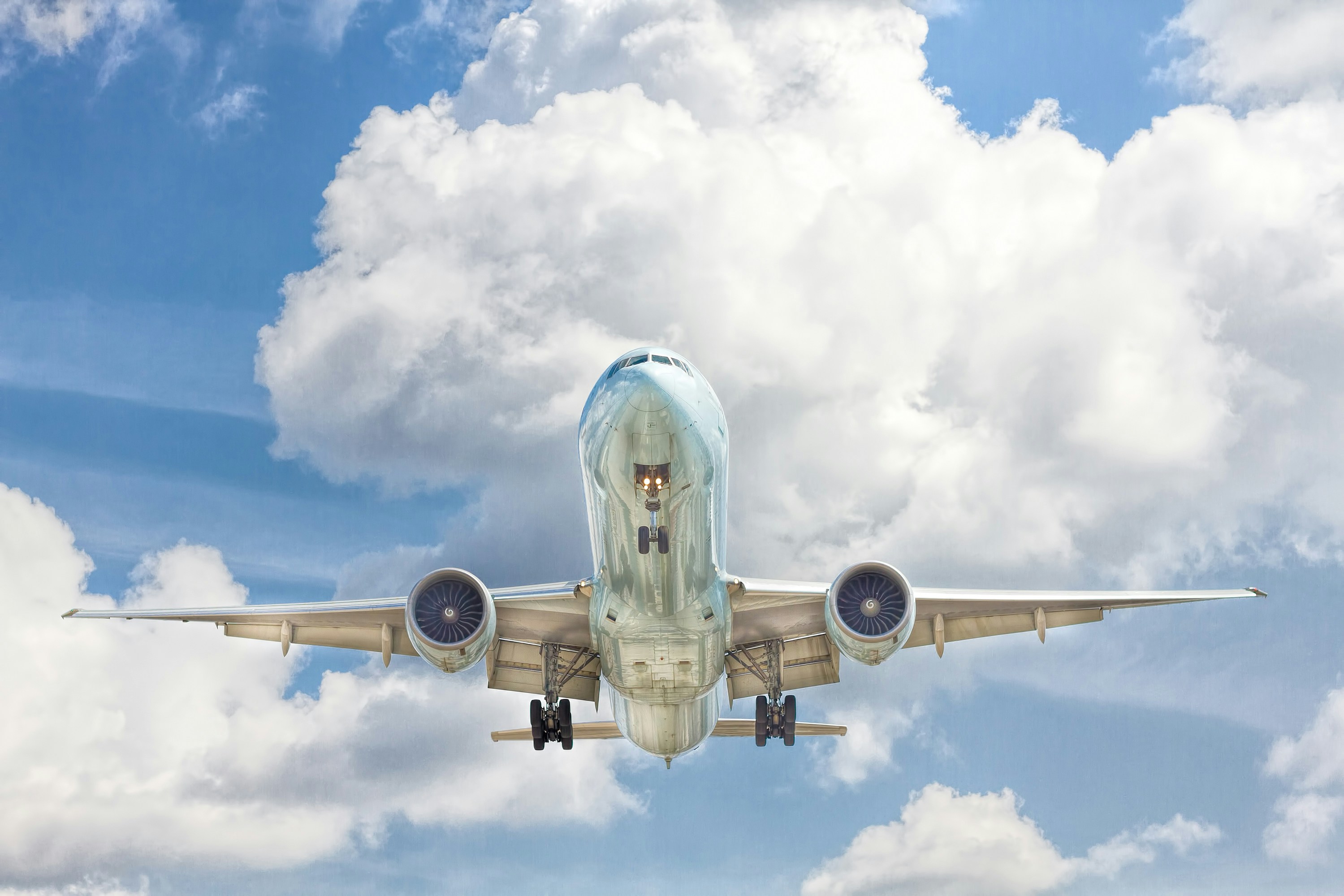 Airplane against clouds